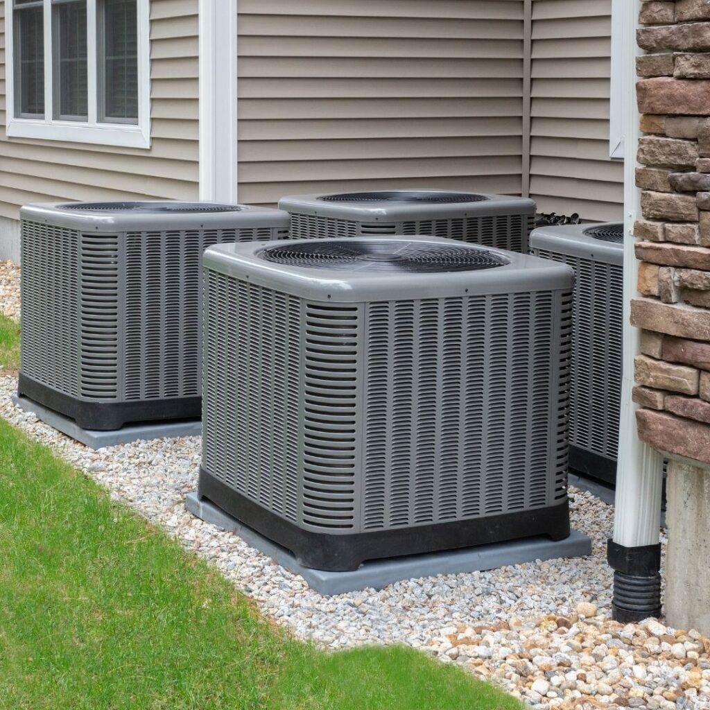 4 AC cabinets outside a building