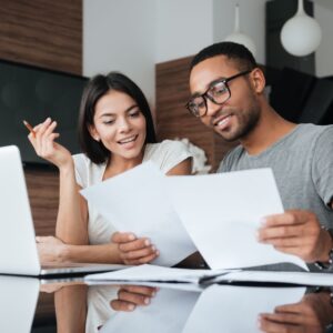Two people looking over documents